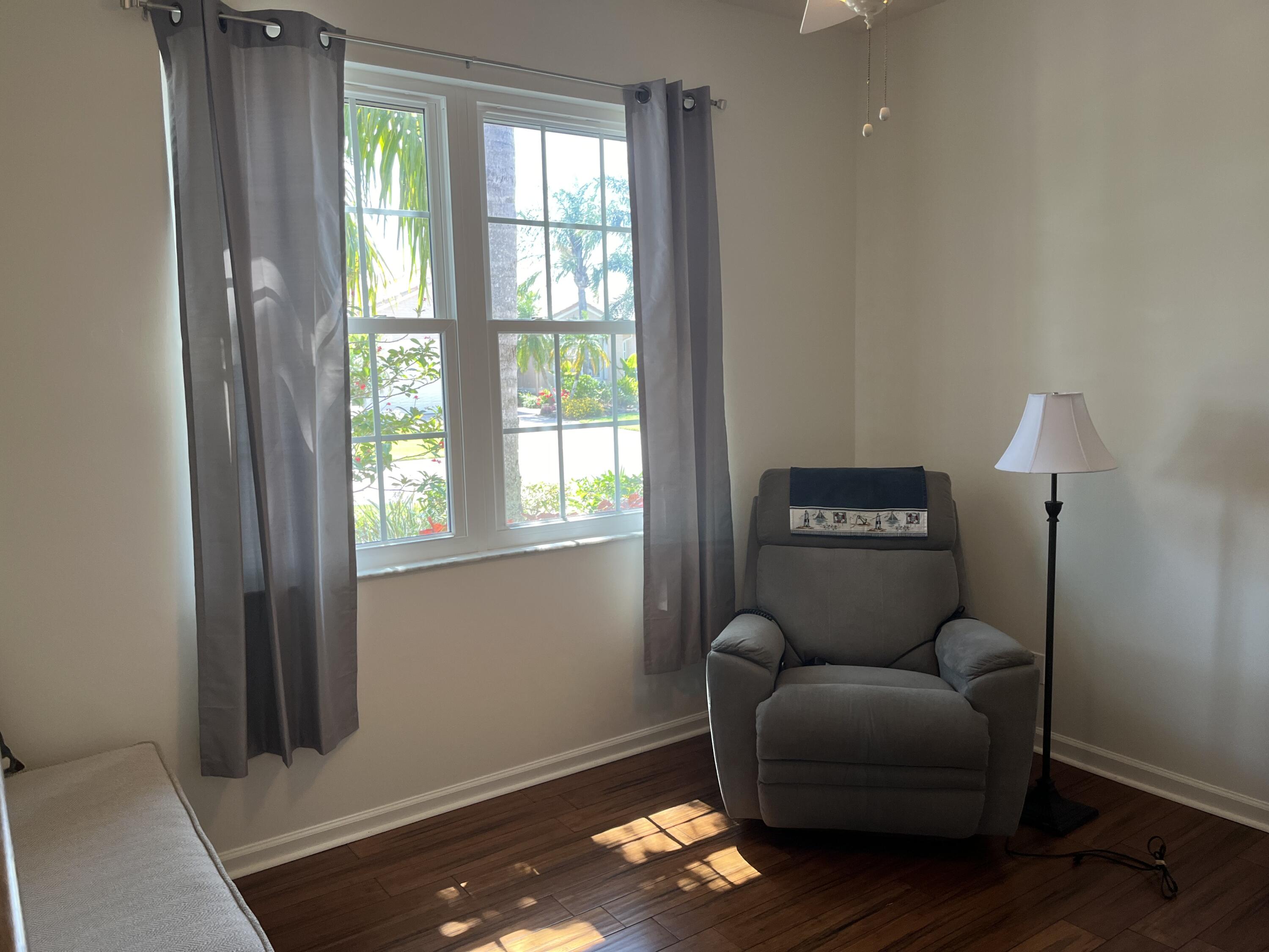 364 Sunview Way Port St. Lucie, FL 34986 - Photo 18 of 34 a living room with furniture and a window