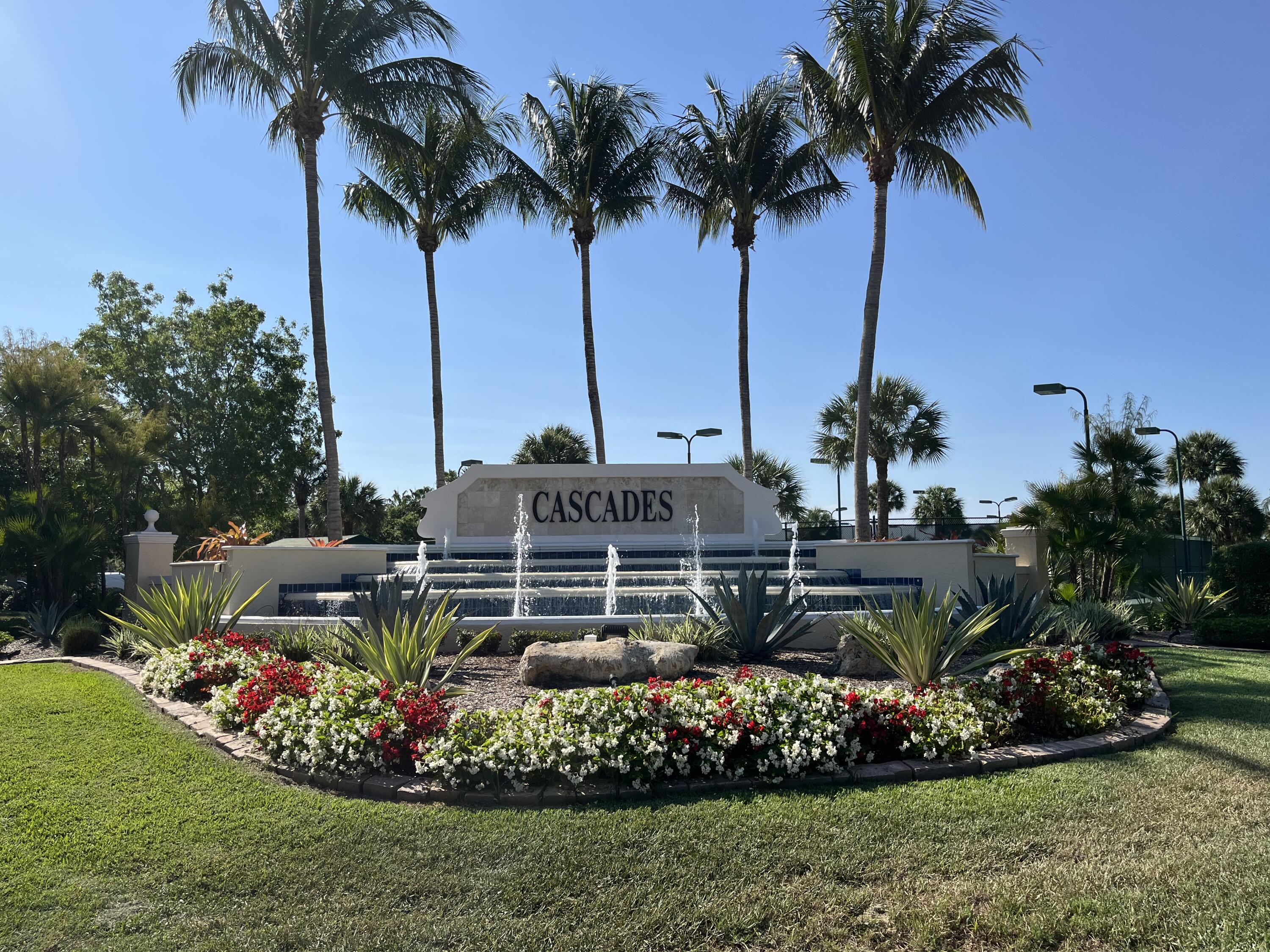 364 Sunview Way Port St. Lucie, FL 34986 - Photo 22 of 34 a view of a garden with a table and chairs potted plants