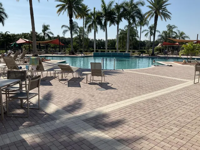 a bench sitting in the middle of a lake