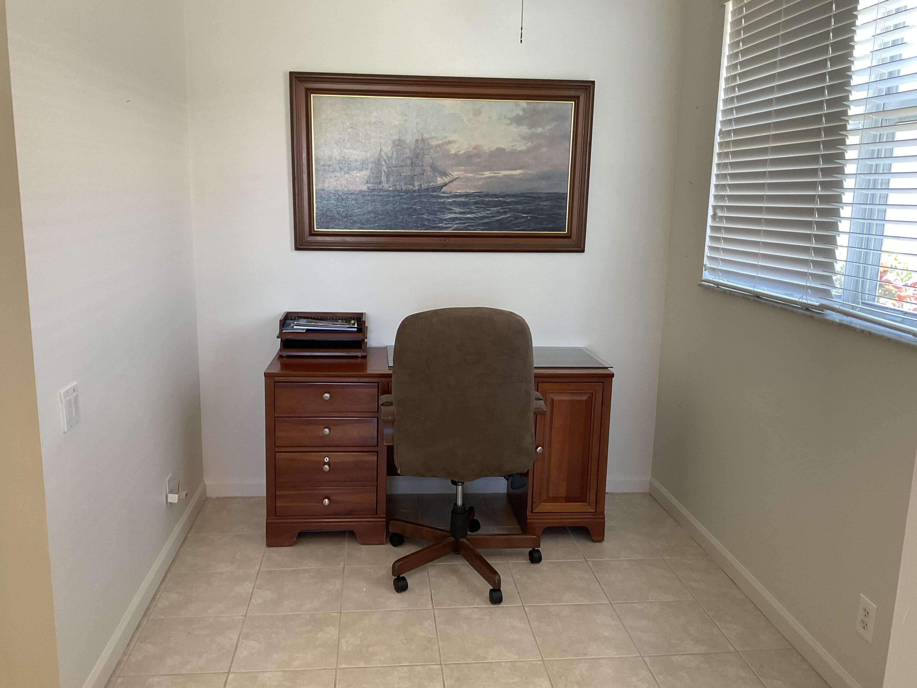 364 Sunview Way Port St. Lucie, FL 34986 - Photo 9 of 34 a workspace with furniture and a window