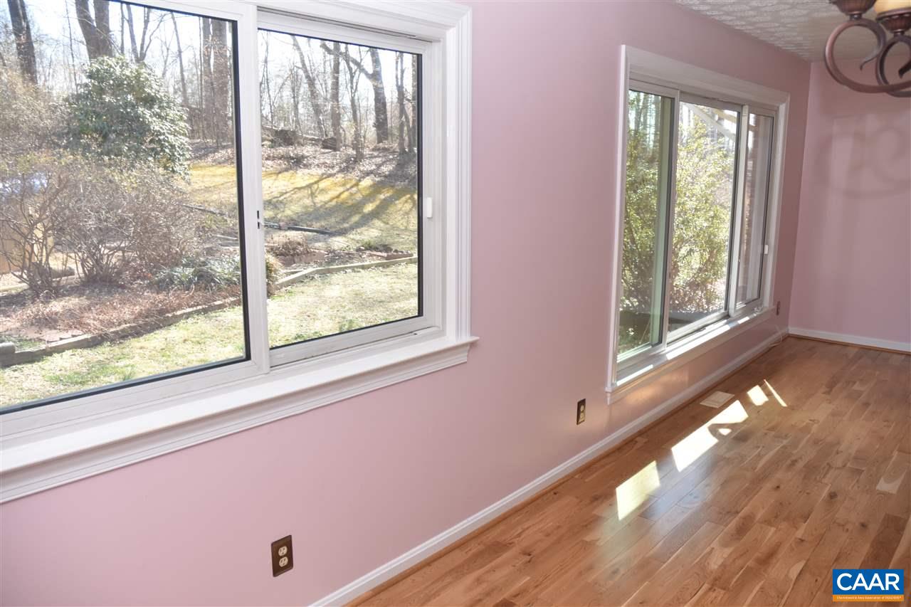 4193 Celt Road Stanardsville, VA 22973 - Photo 15 of 35 a view of an empty room with wooden floor and a window