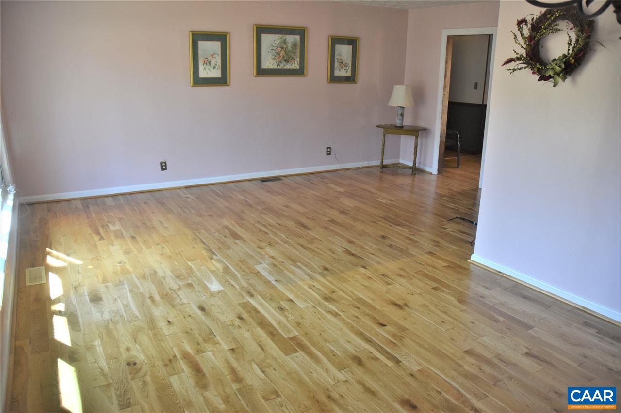 4193 Celt Road Stanardsville, VA 22973 - Photo 26 of 35 a view of an empty room with wooden floor