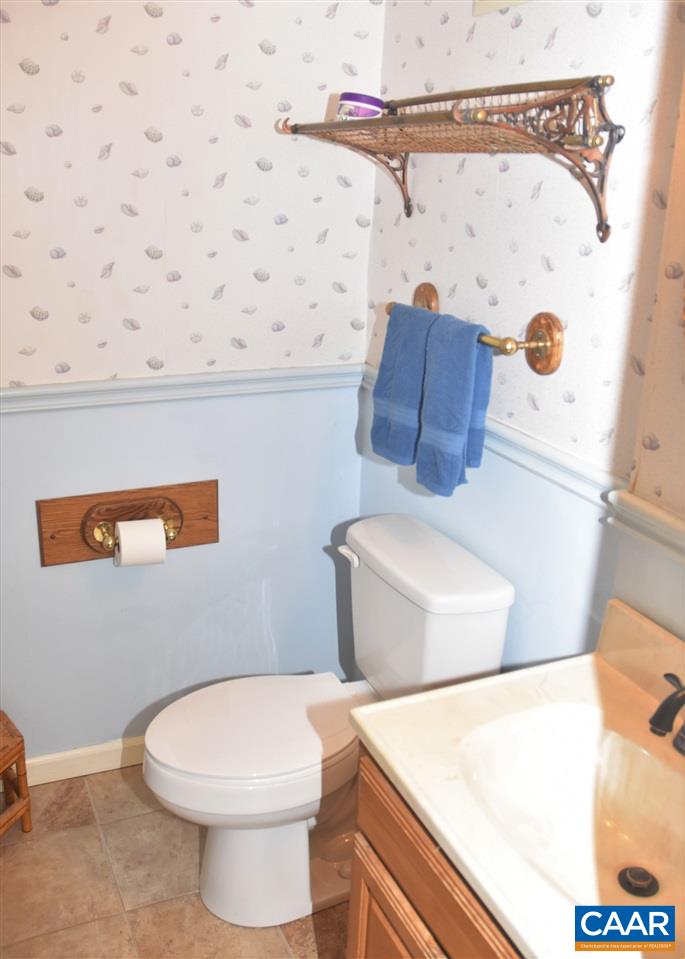 4193 Celt Road Stanardsville, VA 22973 - Photo 30 of 35 a white toilet sitting next to a shower