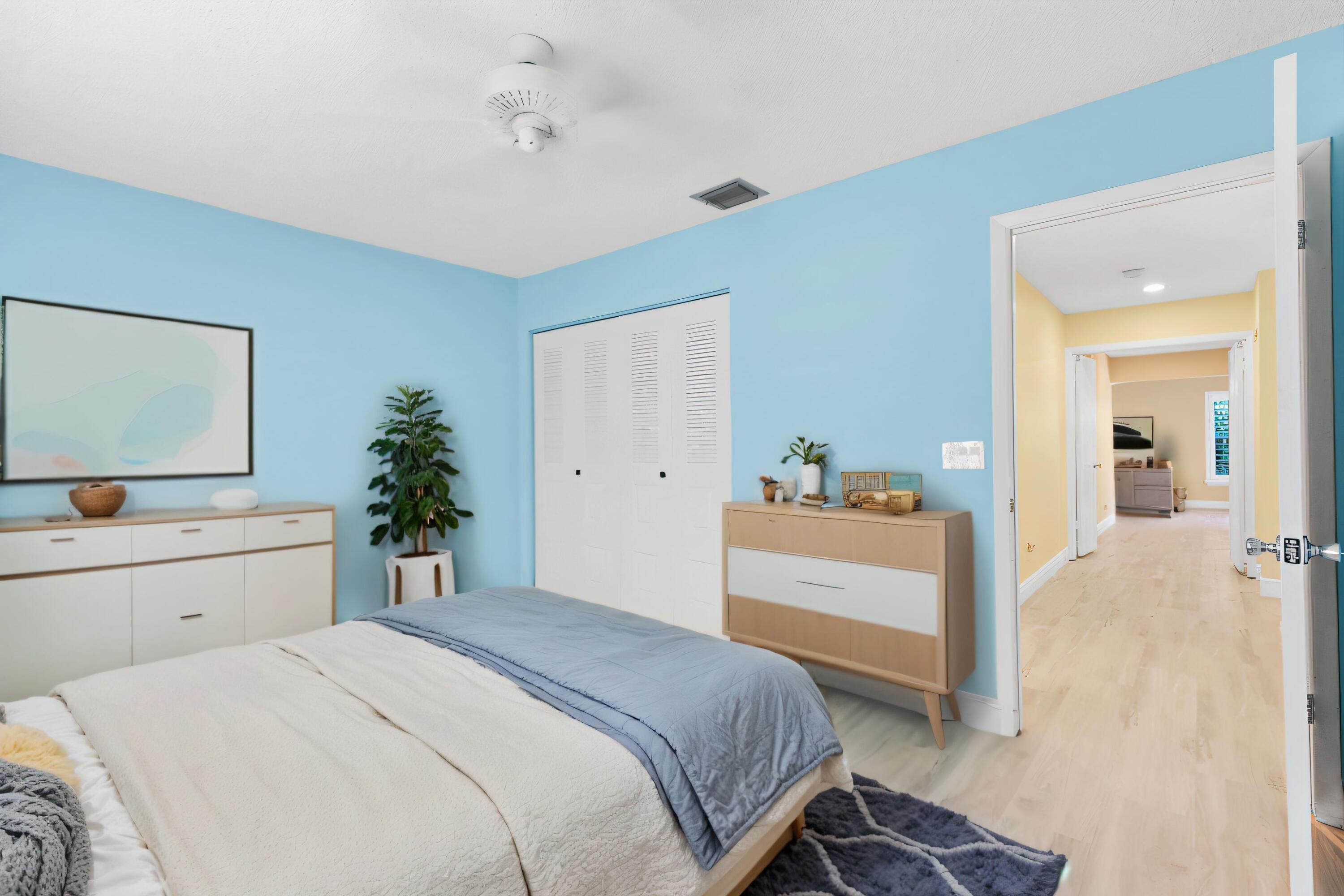 2685 Riviera Drive Delray Beach, FL 33445 - Photo 24 of 48 a bedroom with a bed and a dresser