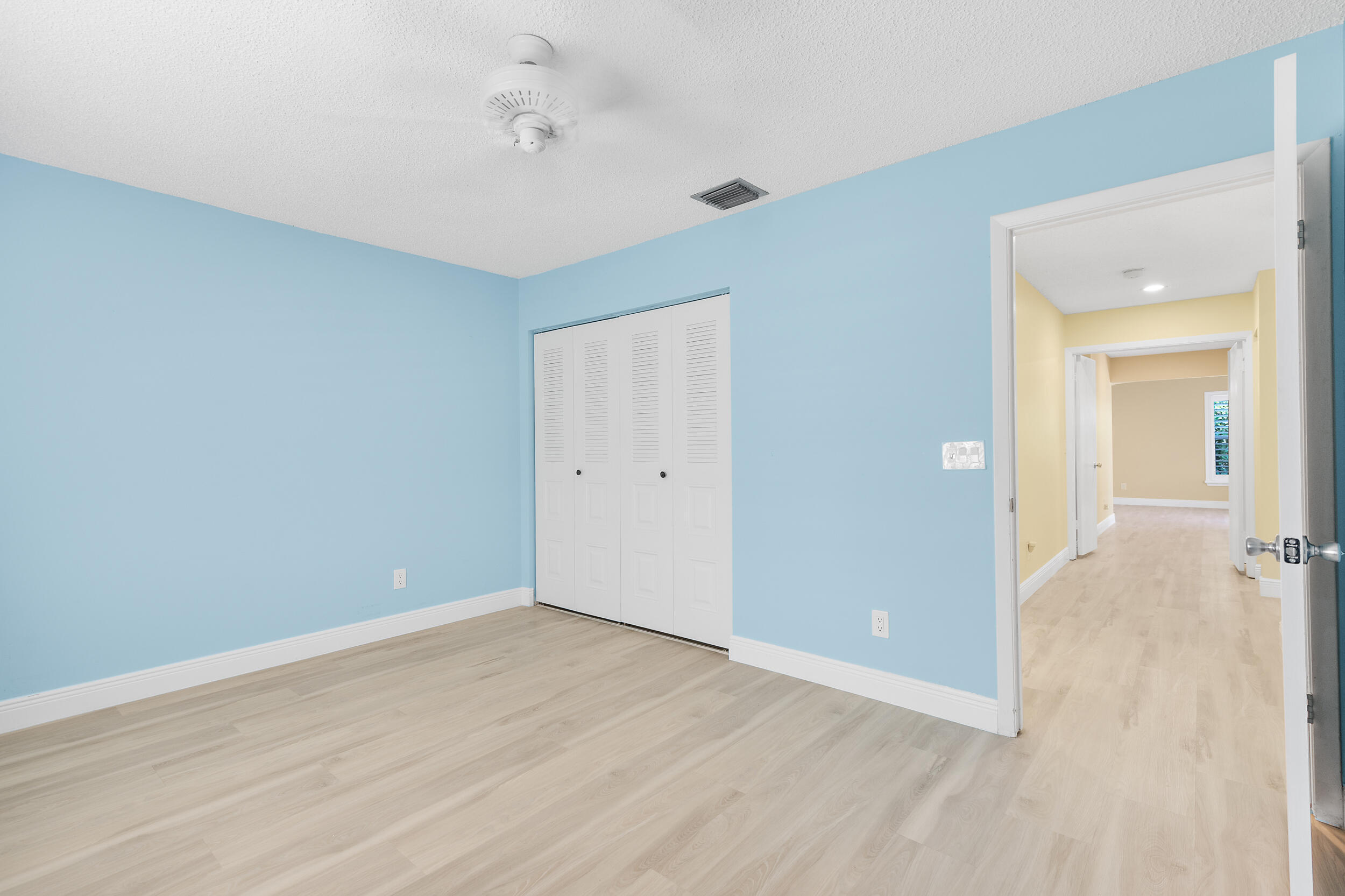 2685 Riviera Drive Delray Beach, FL 33445 - Photo 25 of 48 wooden floor in an empty room