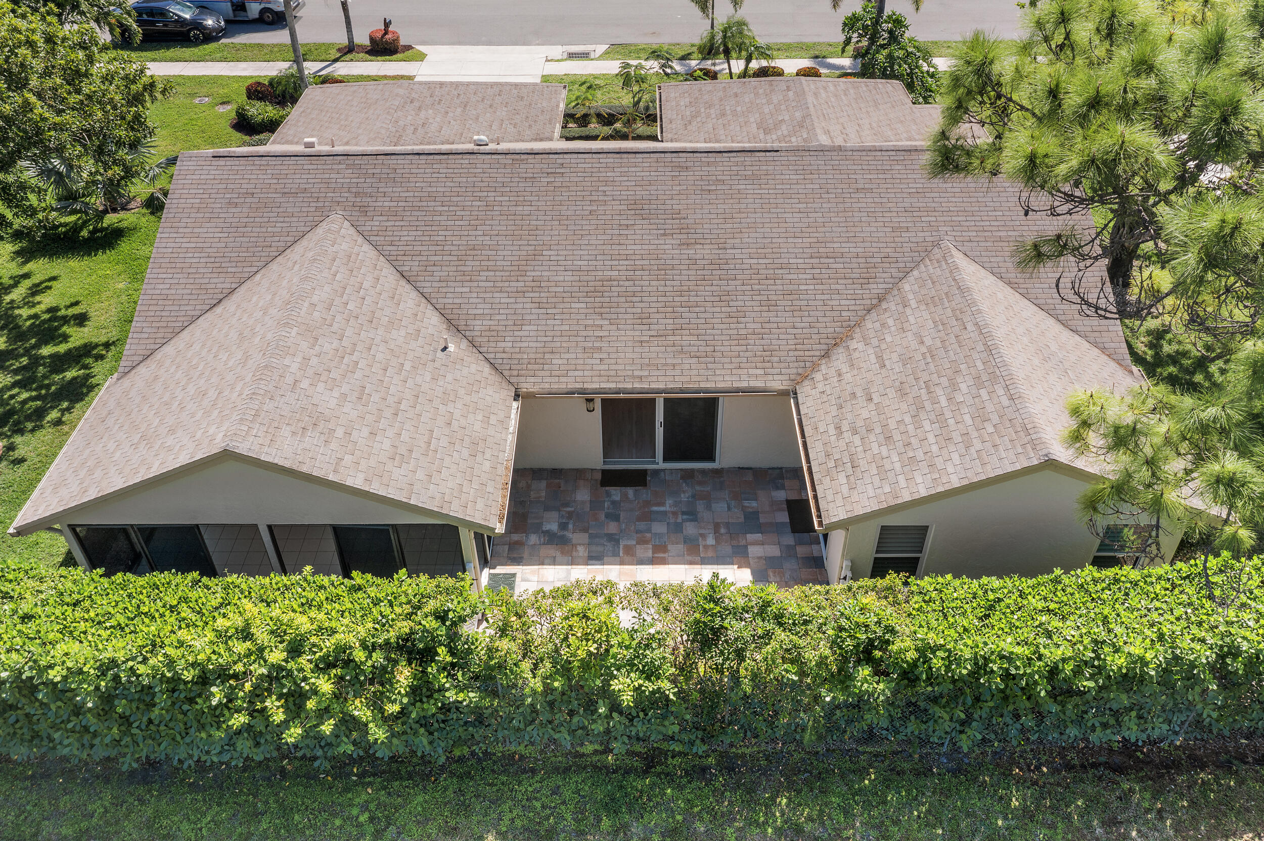 2685 Riviera Drive Delray Beach, FL 33445 - Photo 35 of 48 an aerial view of a house with a yard and potted plants
