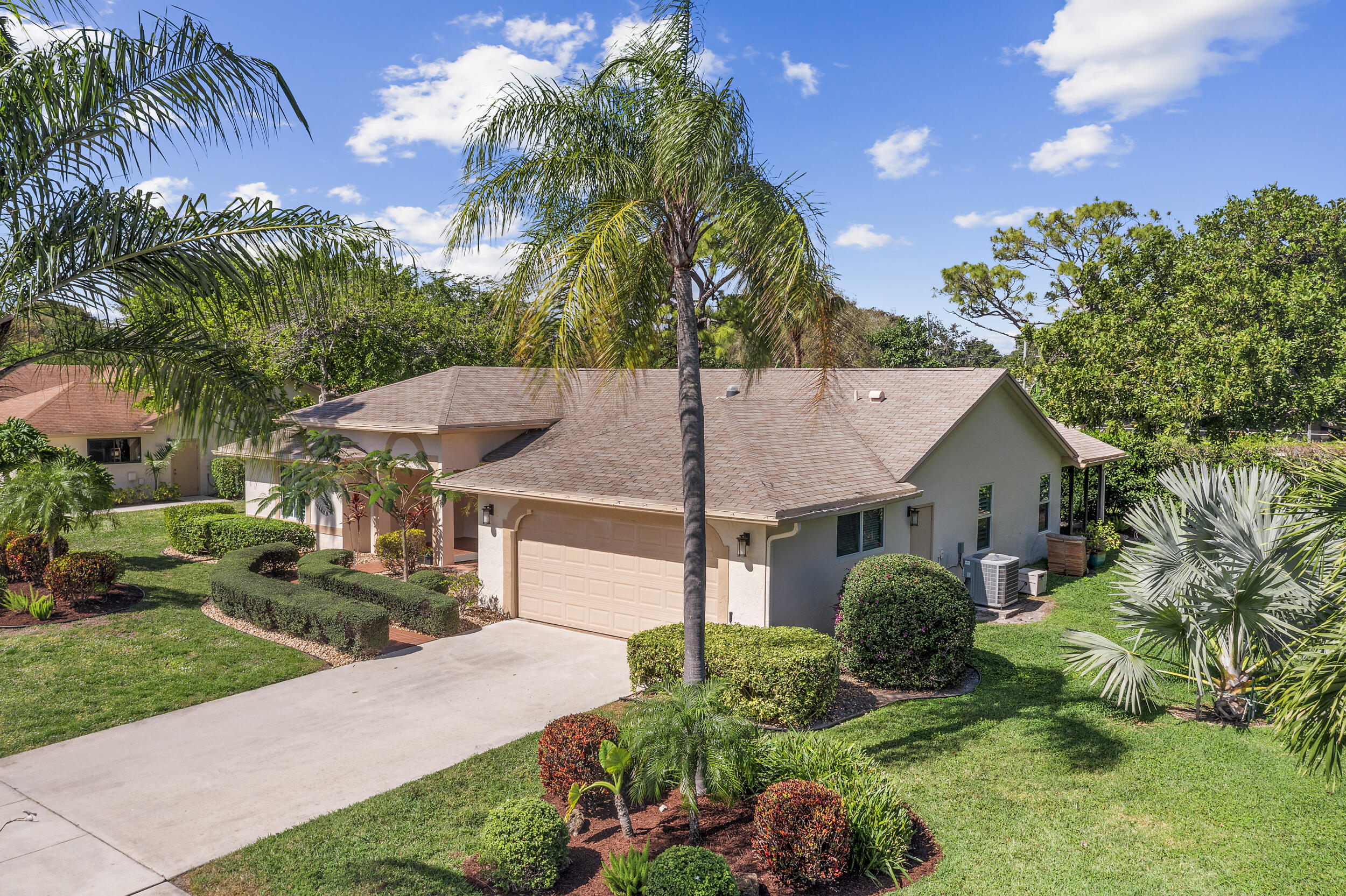 2685 Riviera Drive Delray Beach, FL 33445 - Photo 4 of 48 a aerial view of a house with a yard and potted plants
