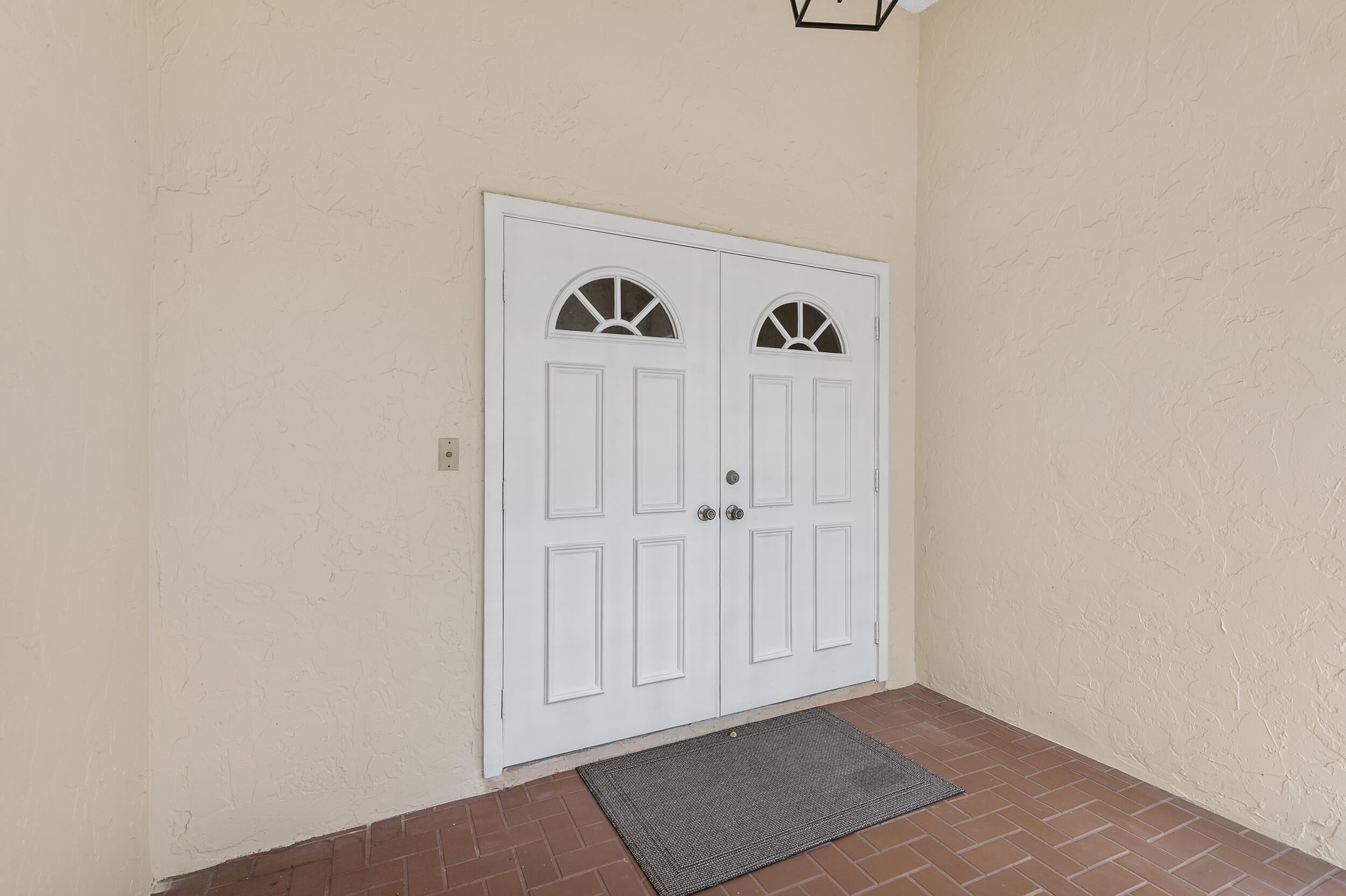 2685 Riviera Drive Delray Beach, FL 33445 - Photo 6 of 48 a view of front door