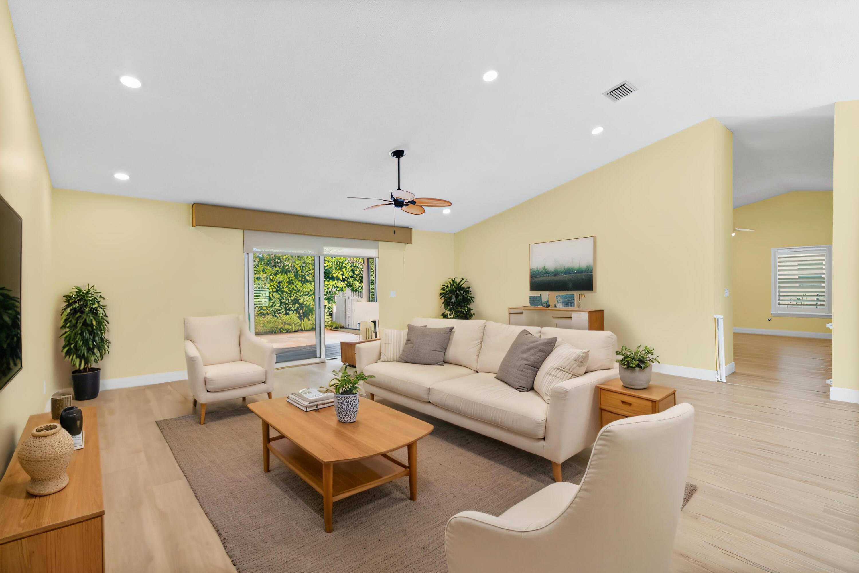 2685 Riviera Drive Delray Beach, FL 33445 - Photo 7 of 48 a living room with furniture and a large window