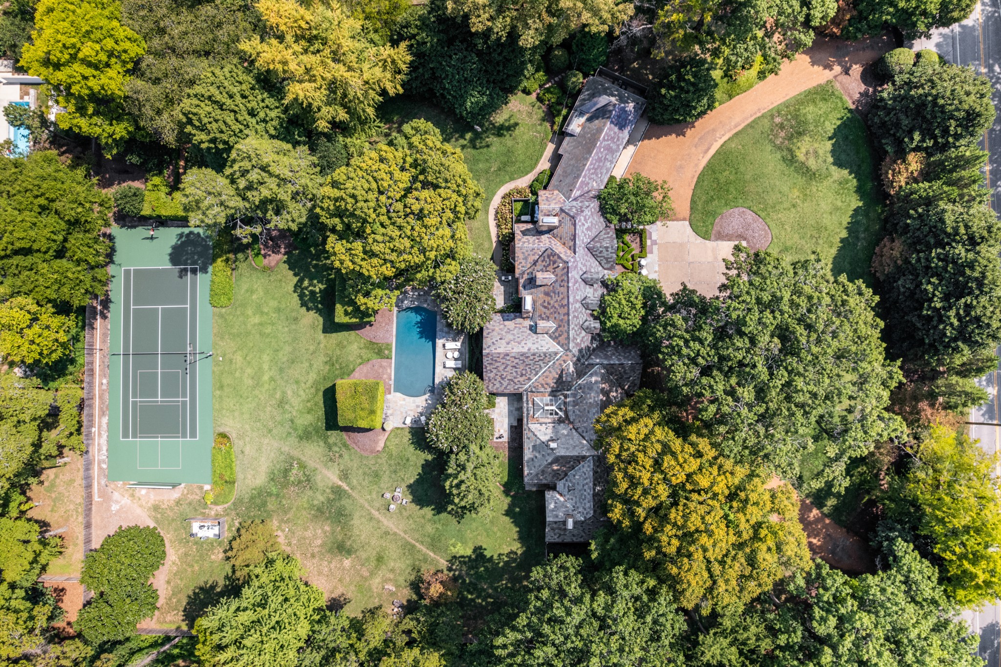 3800 Woodlawn Drive Nashville, TN 37215 - Photo 1 of 43 an aerial view of a house with a yard and garden