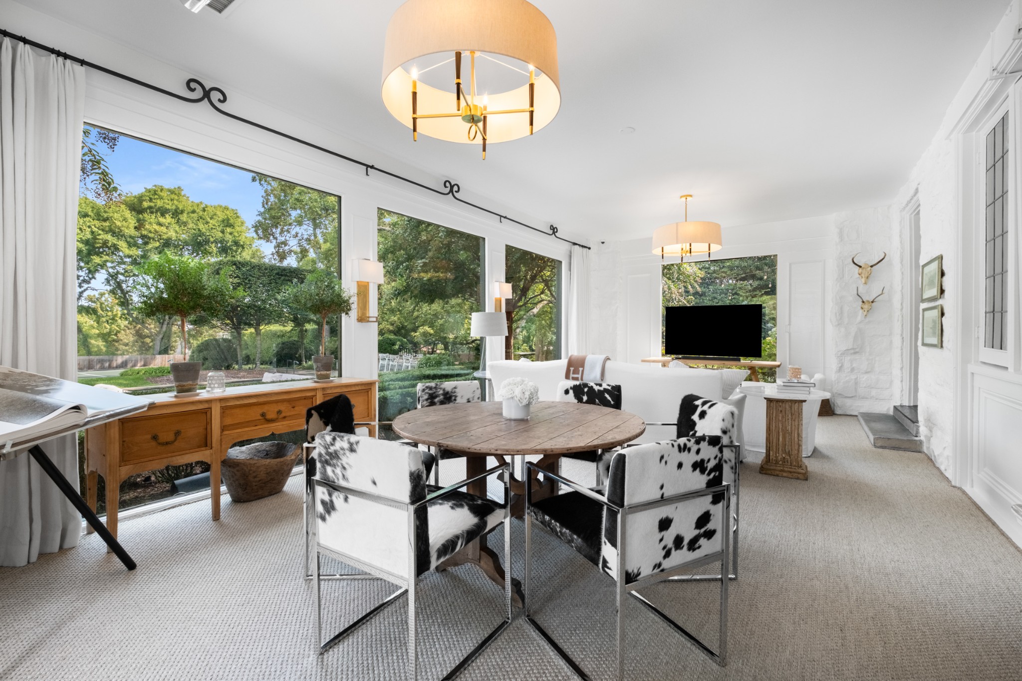 3800 Woodlawn Drive Nashville, TN 37215 - Photo 14 of 43 a view of a dining room with furniture window and outside view