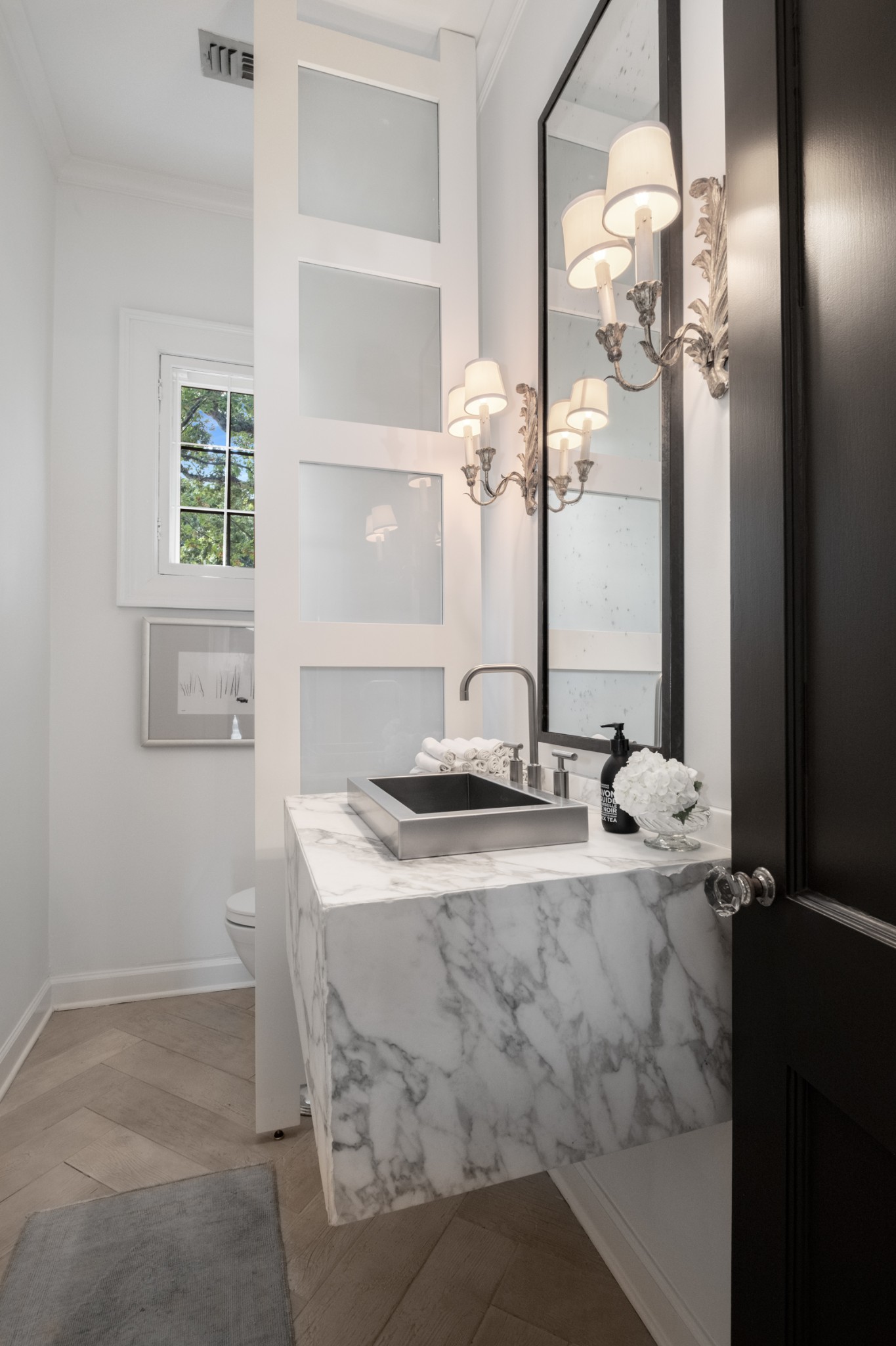 3800 Woodlawn Drive Nashville, TN 37215 - Photo 24 of 43 a bathroom with a granite countertop sink a mirror and a shower