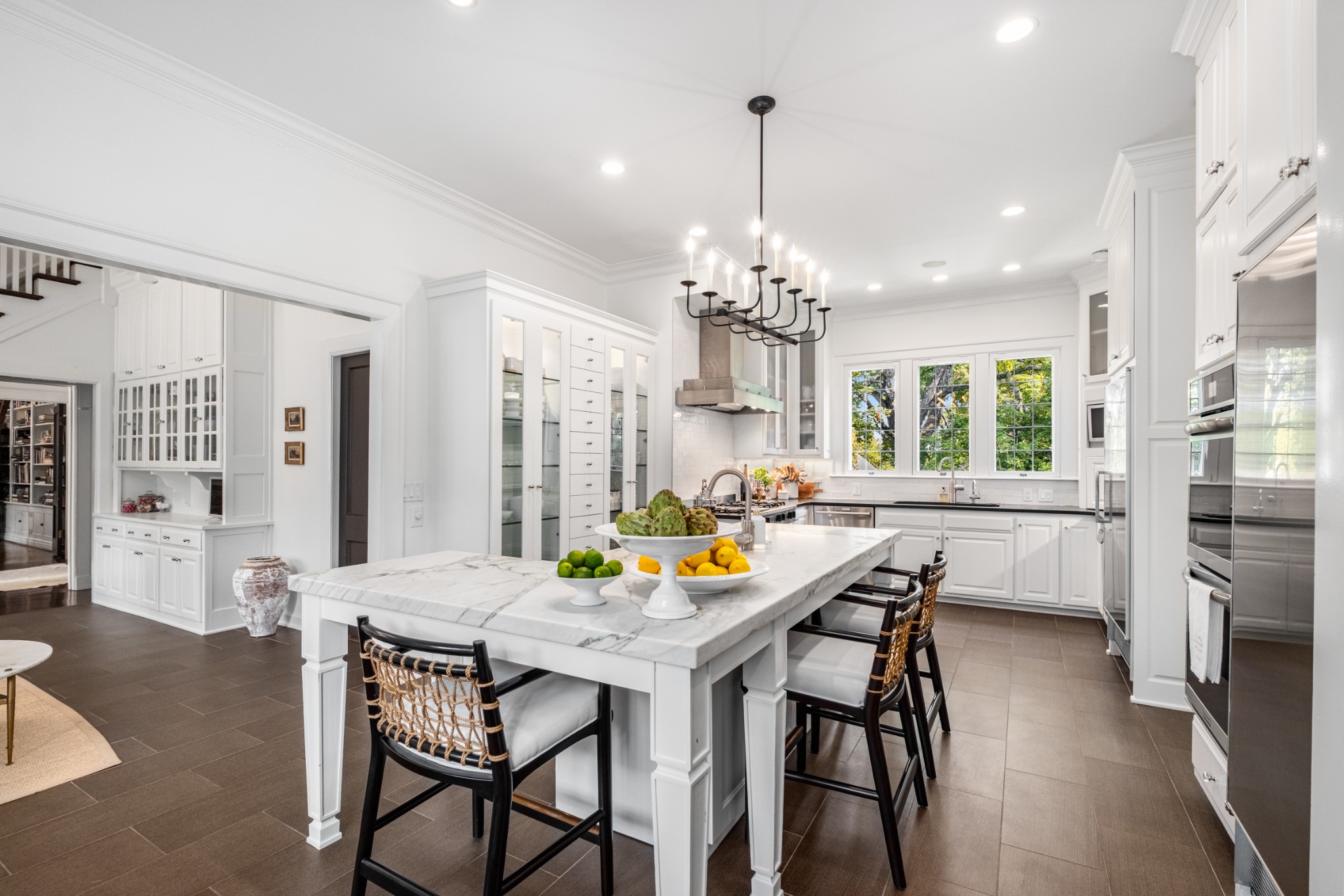 3800 Woodlawn Drive Nashville, TN 37215 - Photo 28 of 43 a view of a dining room with furniture and chandelier