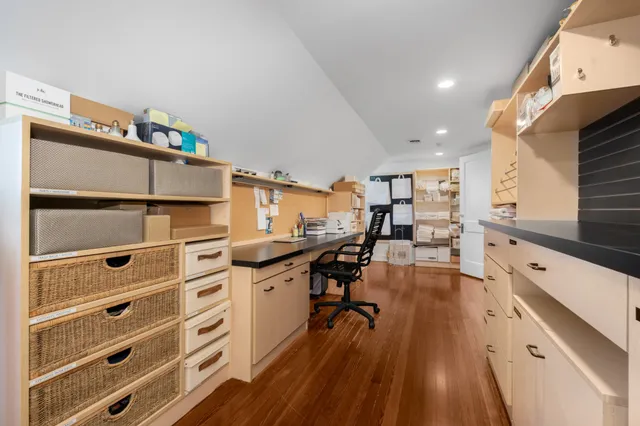 a view of a house with swimming pool and a yard