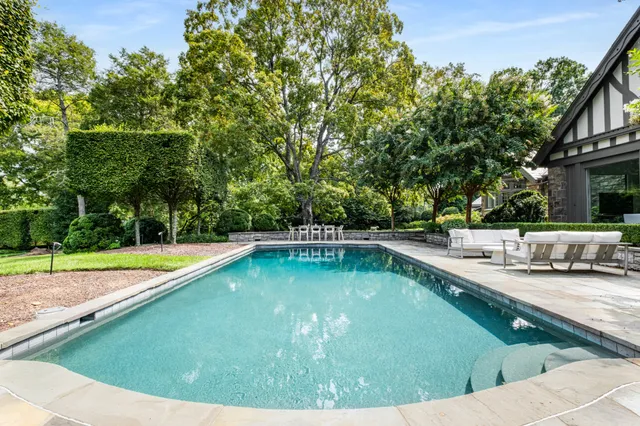 a view of a back yard of the house