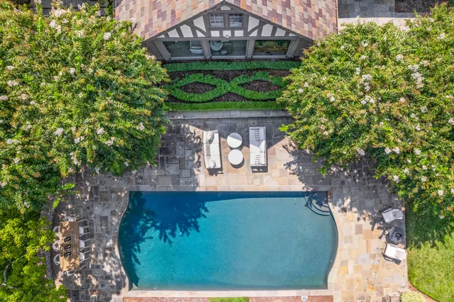 a front view of a house with swimming pool