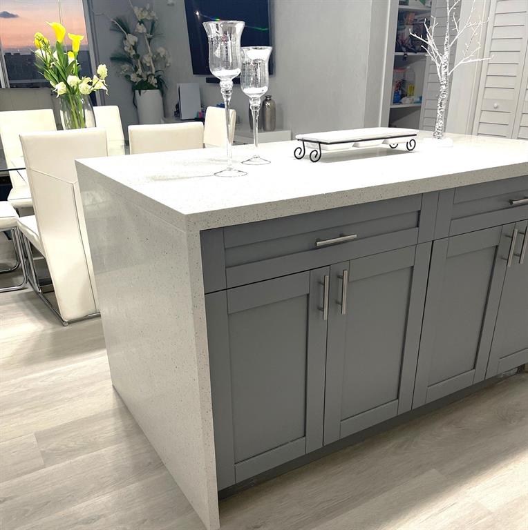 6950 Northwest 186th Street, Unit 2510 Hialeah, FL 33015 - Photo 8 of 19 a dining table with a sink and a mirror