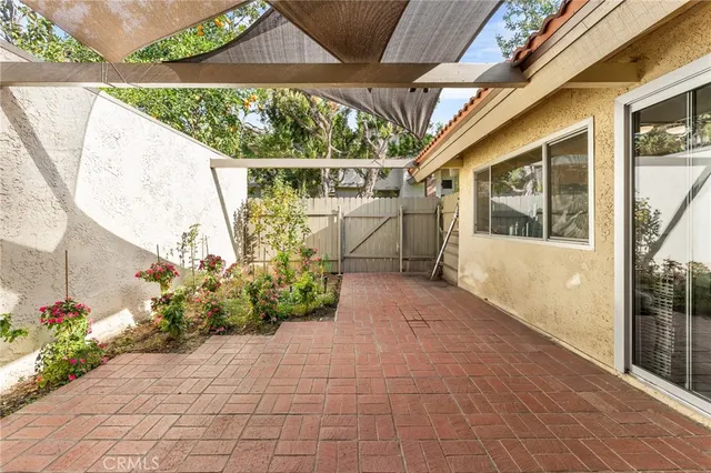 a view of a porch with furniture