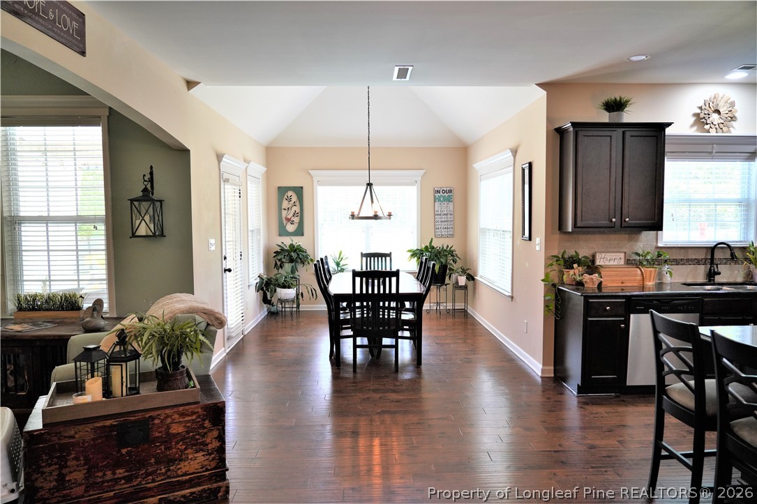 930 Old Vander Road Fayetteville, NC 28312 - Photo 13 of 45 a view of a dining room with furniture window and wooden floor