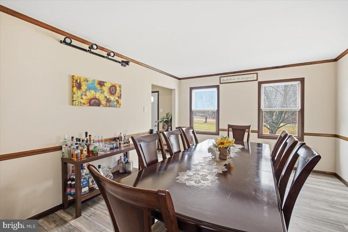 1518 Commissioners Road Mullica Hill, NJ 08062 - Photo 16 of 35 a dining room with furniture and window