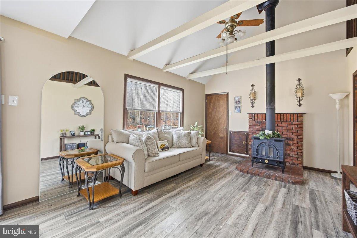 1518 Commissioners Road Mullica Hill, NJ 08062 - Photo 22 of 35 a bed room with a bed and a chair