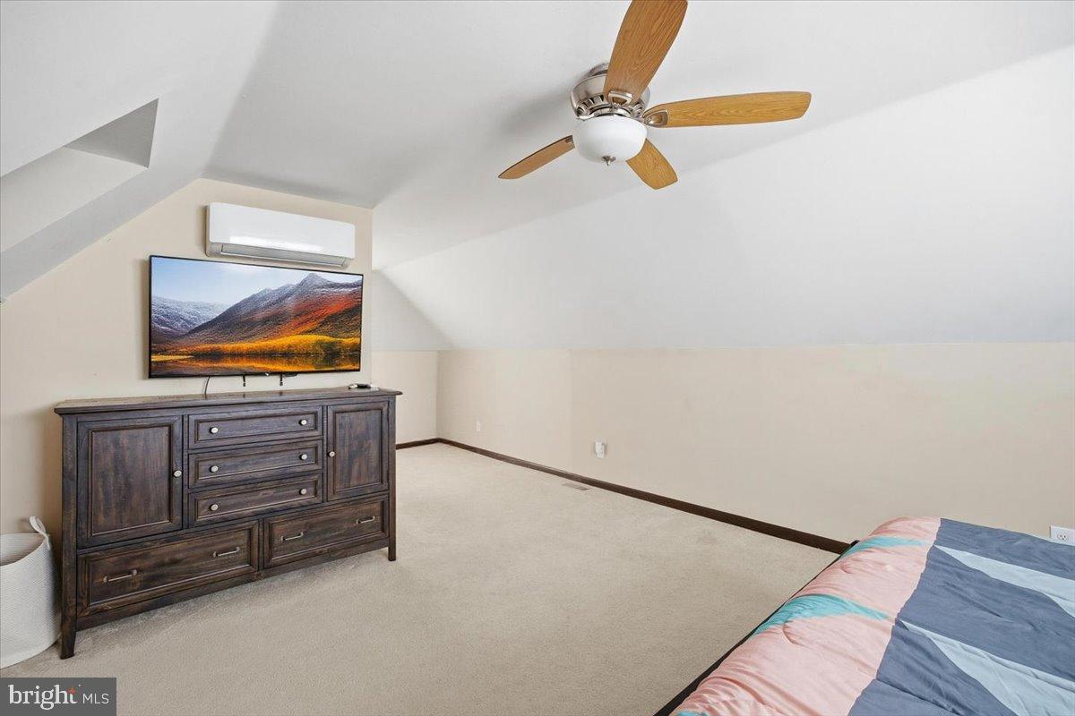 1518 Commissioners Road Mullica Hill, NJ 08062 - Photo 25 of 35 a living room with furniture and a flat screen tv