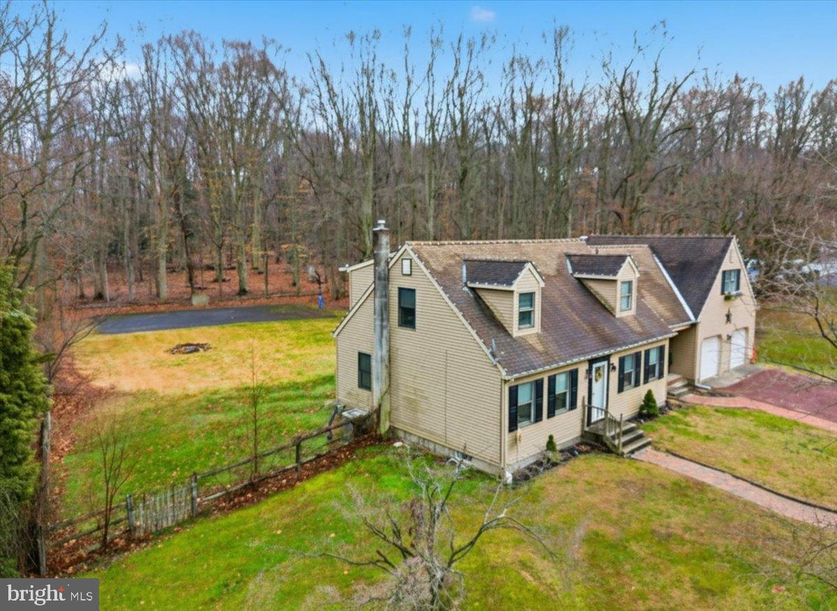 1518 Commissioners Road Mullica Hill, NJ 08062 - Photo 6 of 35 a view of a house with pool and a yard