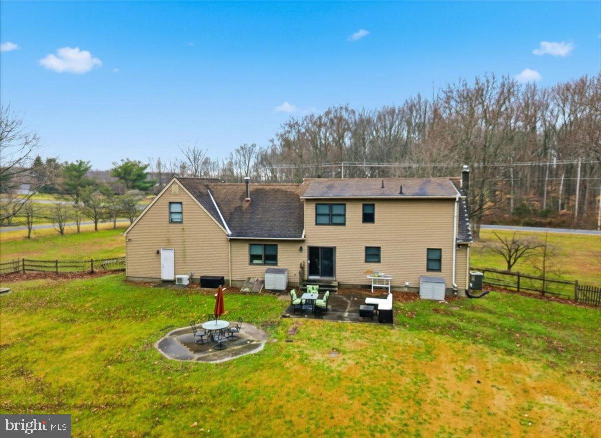 1518 Commissioners Road Mullica Hill, NJ 08062 - Photo 7 of 35 a front view of a house with garden