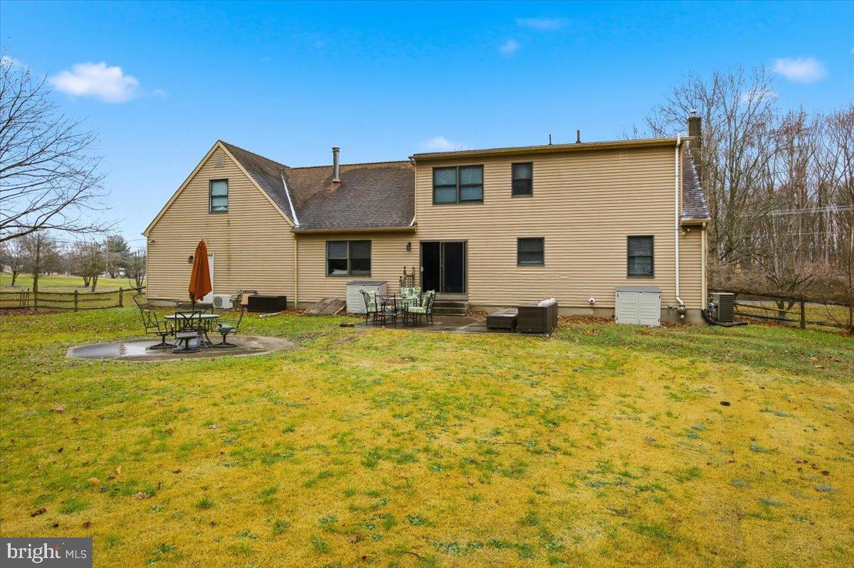 1518 Commissioners Road Mullica Hill, NJ 08062 - Photo 8 of 35 a view of a swimming pool with outdoor seating and yard