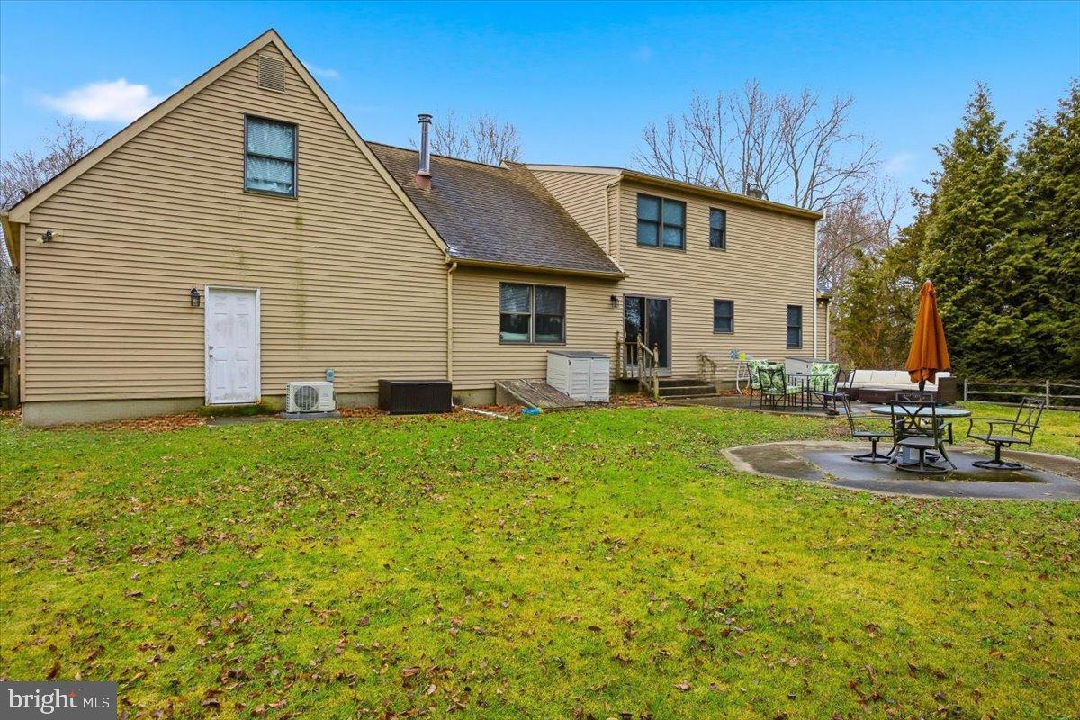 1518 Commissioners Road Mullica Hill, NJ 08062 - Photo 9 of 35 a view of a house with backyard and sitting area
