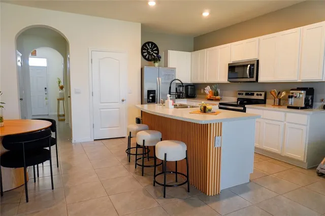 a bathroom with a toilet and a sink