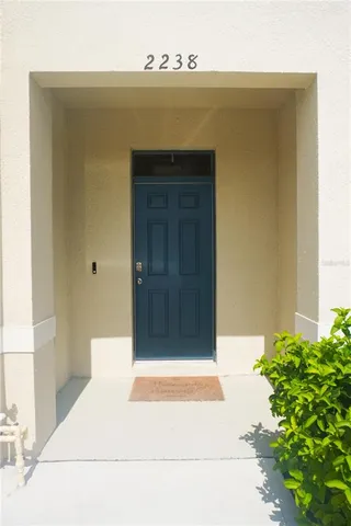 a view of entryway with cabinet
