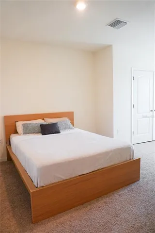 a view of a hallway with a window