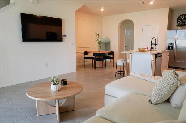 a kitchen with a stove and a microwave