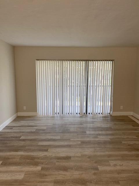 201 Foxtail Drive, Unit C2 Greenacres, FL 33415 - Photo 7 of 12 a view of a room with wooden floor