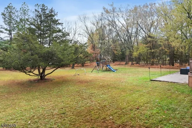 a house with trees in front of it
