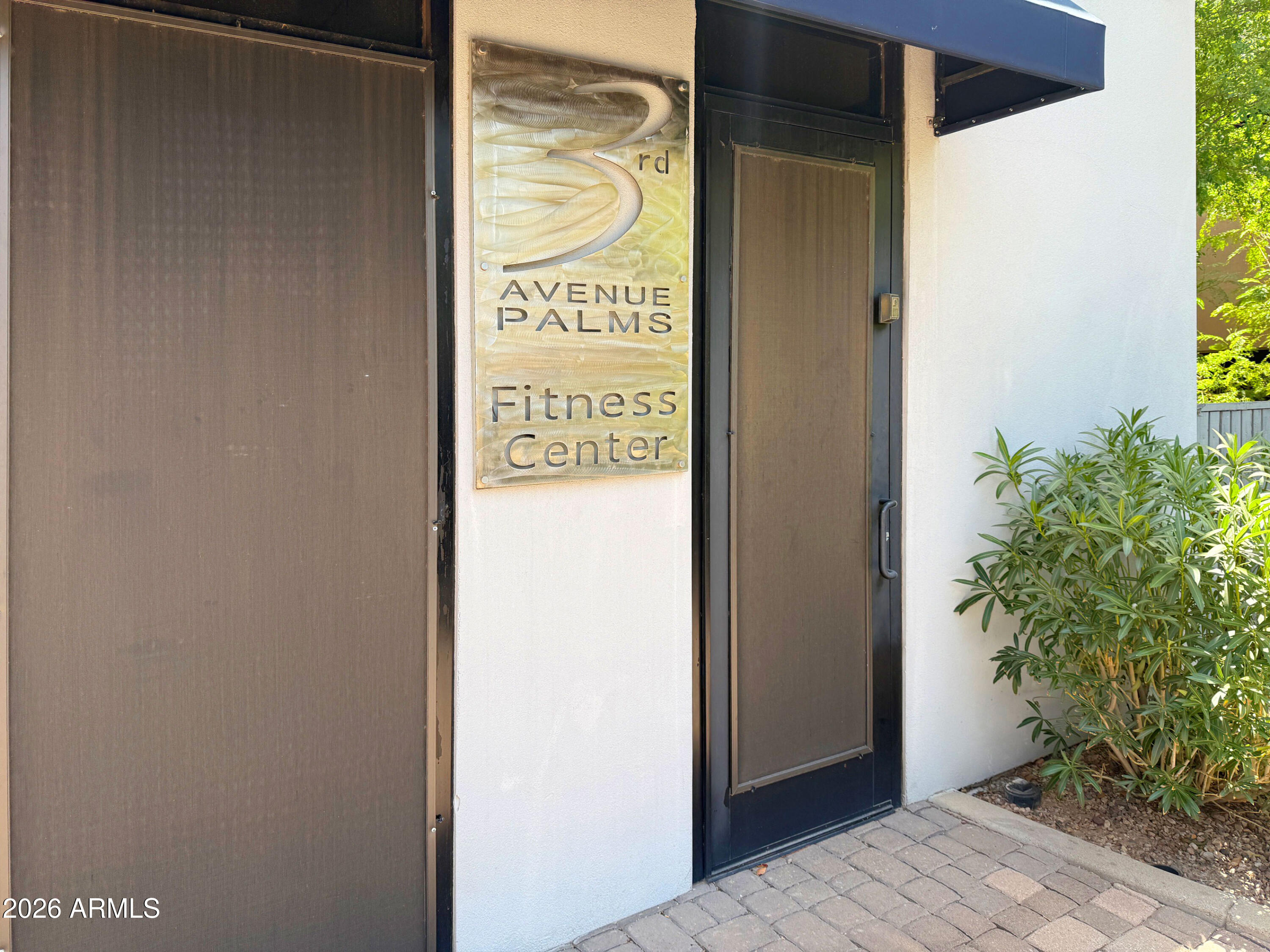 3633 North 3rd Avenue, Unit 1027 Phoenix, AZ 85013 - Photo 22 of 29 a sign on the side of a building