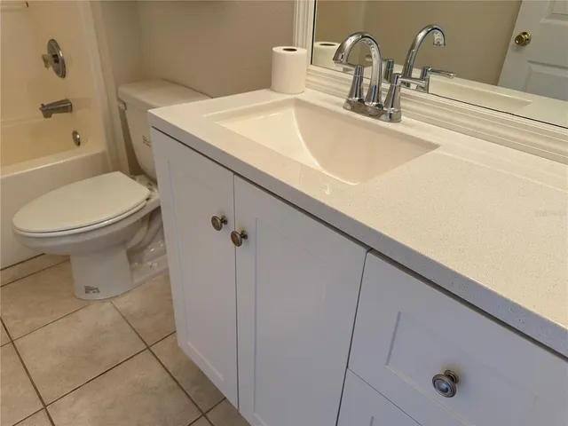 a bathroom with a sink and a toilet