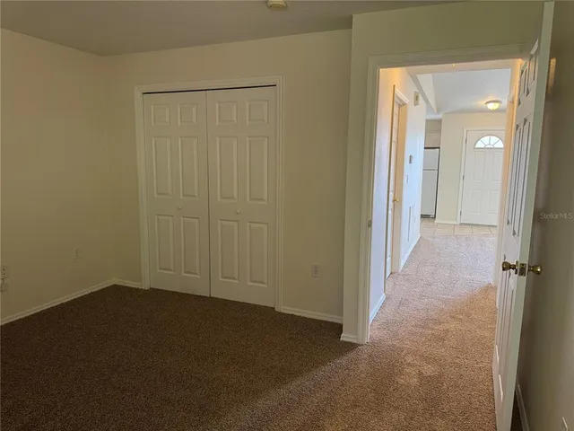 a view of a house with a big yard