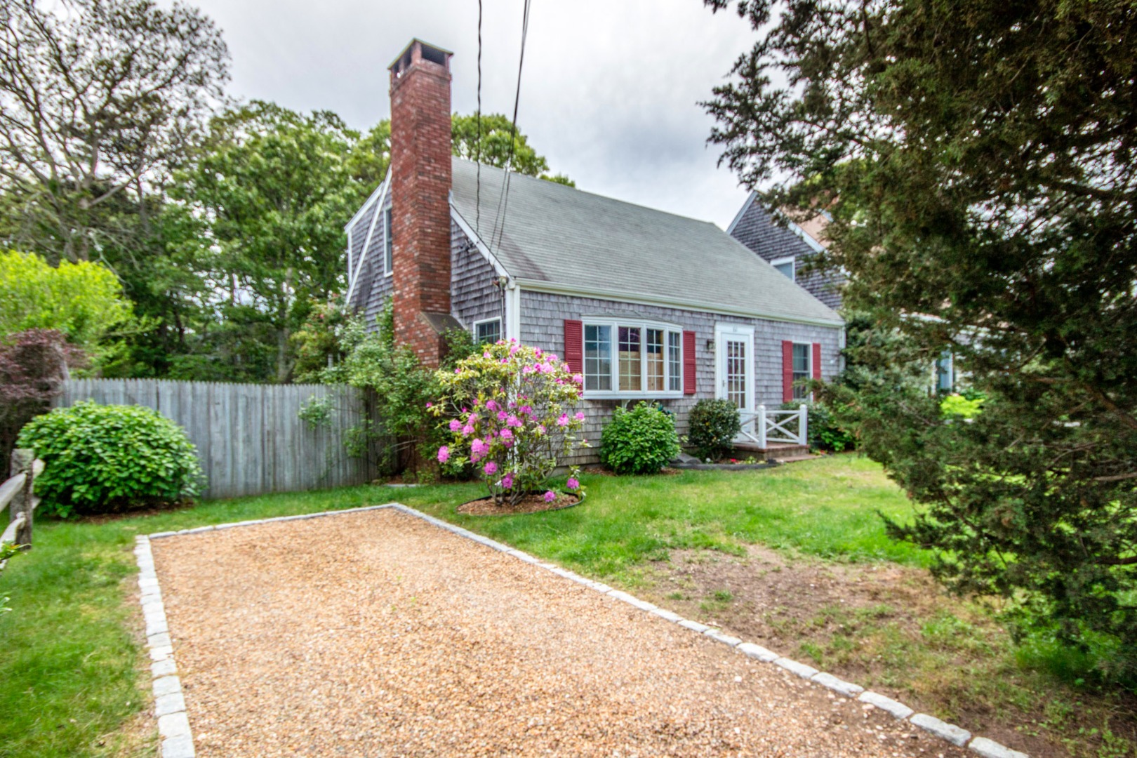 60 Pinehurst Road Edgartown, MA 02539 - Photo 1 of 25 a house view with a garden space