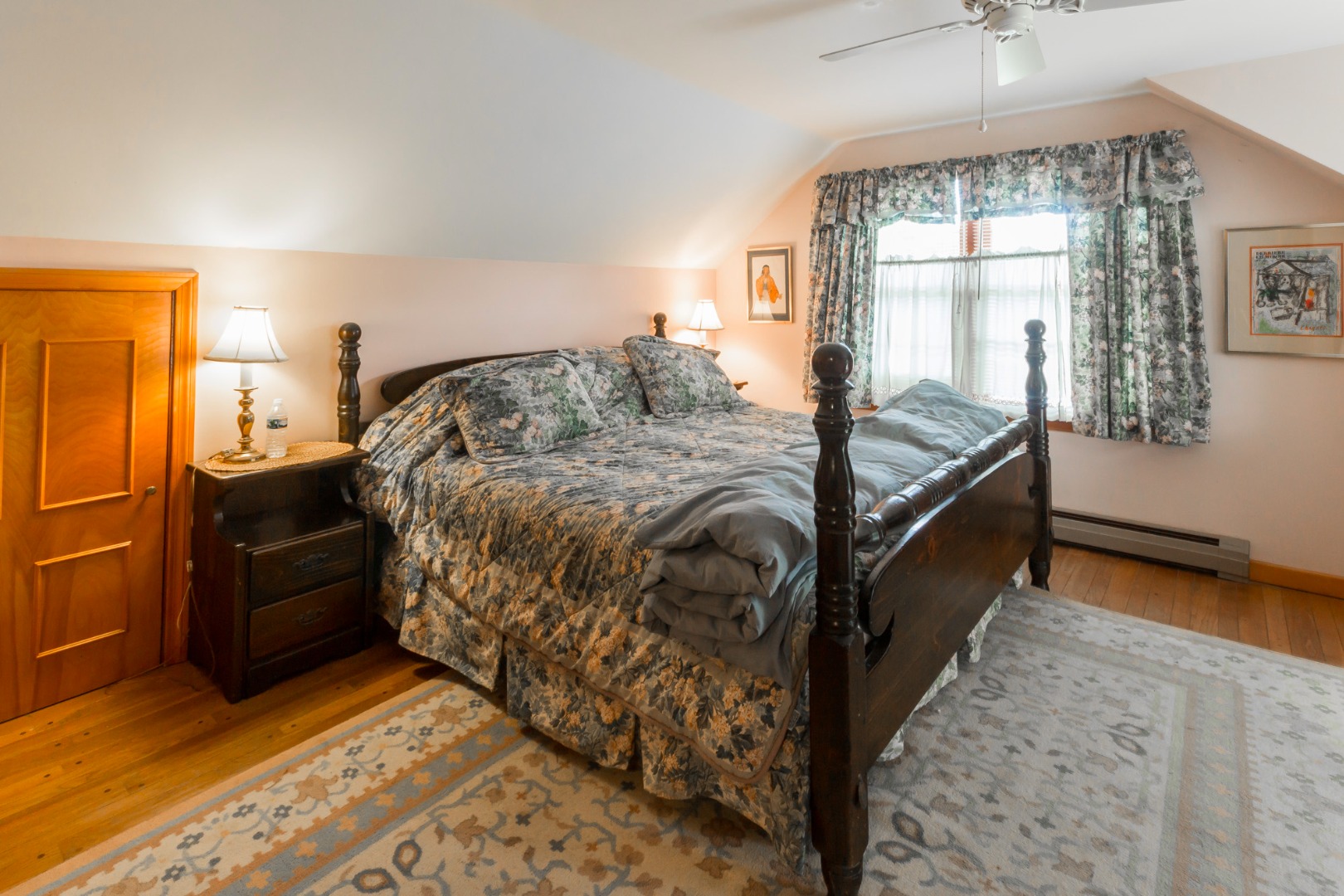 60 Pinehurst Road Edgartown, MA 02539 - Photo 14 of 25 a bed sitting in a bedroom next to a window