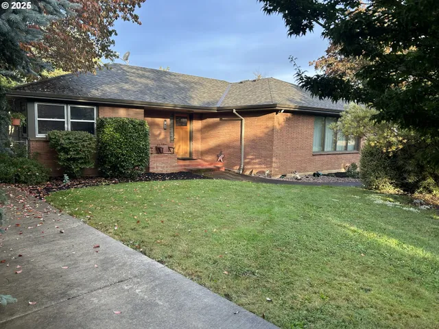a view of a house with a garden