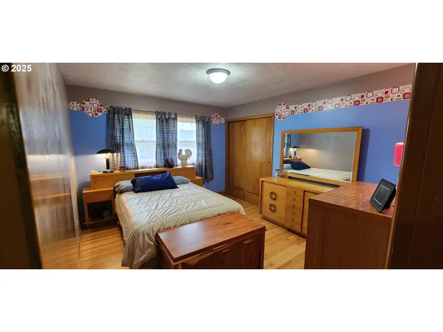 a kitchen with granite countertop a sink and cabinets