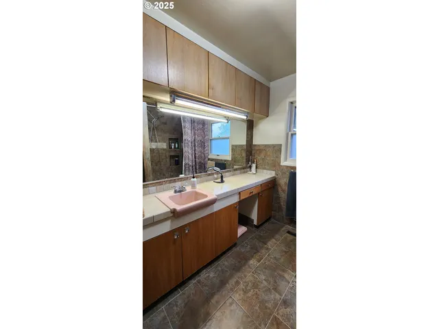 a hallway with a large window