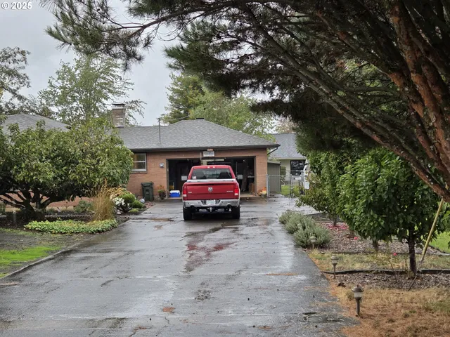 a car parked in front of a house