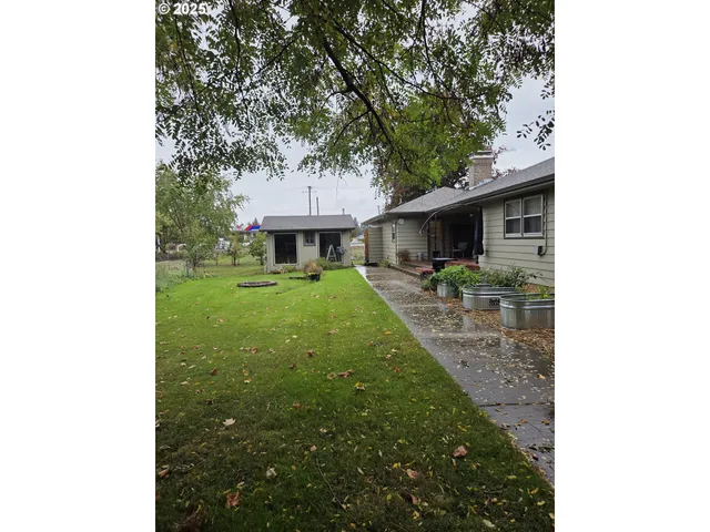 a view of a house with a street