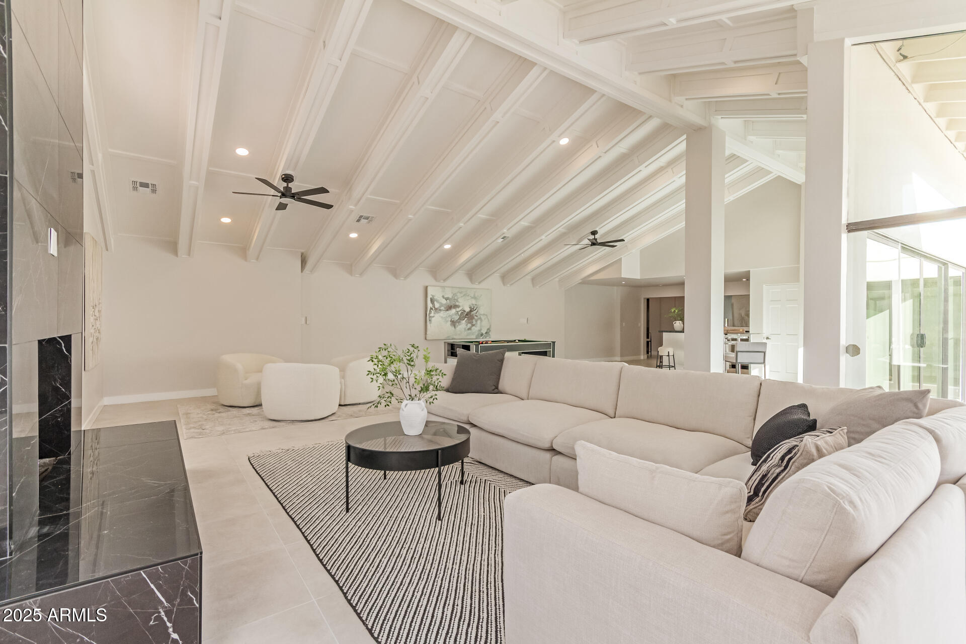3301 East Rovey Avenue Paradise Valley, AZ 85253 - Photo 18 of 105 a living room with furniture and a large window