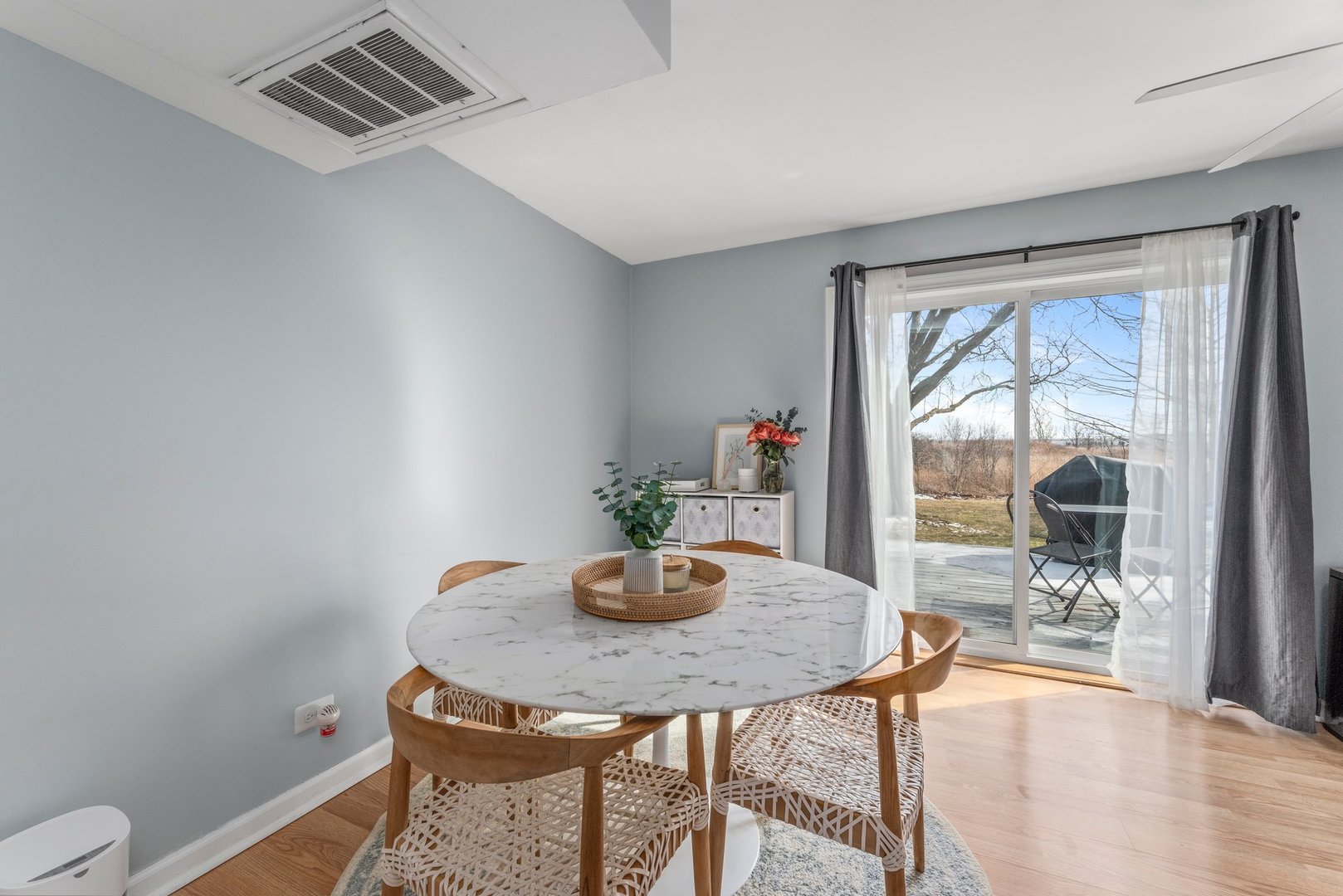 2655 Prairieview Lane South Aurora, IL 60502 - Photo 6 of 13 a view of a dining room with furniture and a potted plant