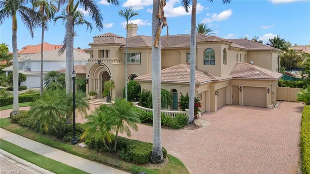 a view of a building with a backyard