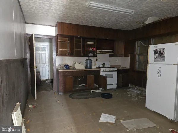 a room with cabinets and flat screen tv